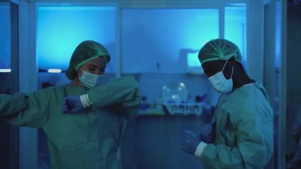 Doctors Wearing Personal Protective Equipment Having Fun Dancing Laboratory Health — Stock Video