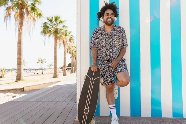 Afro Latin Man Having Fun Listening Music Headphones Tropical Beach — Stock Photo, Image