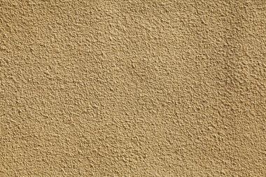 Bej çimento alçı duvar, dokulu arka plan. 