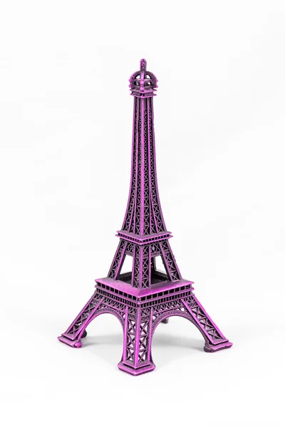 Фиолетовая модель Эйфелевой башни, изолированная на белом фоне — стоковое фото