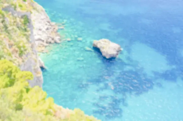 Rozostřeného pozadí s ostrov Capri, Itálie — Stock fotografie