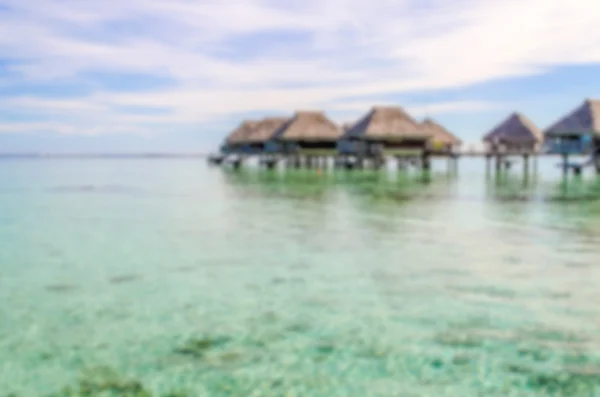 Fundo desfocado com Bungalows Overwater em Polynesi francês — Fotografia de Stock