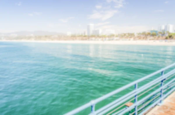 Fondo desenfocado con la playa de Santa Mónica en California, EE.UU. — Foto de Stock