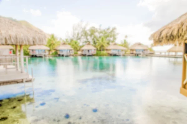 Fundo desfocado com Bungalows Overwater em Polynesi francês — Fotografia de Stock