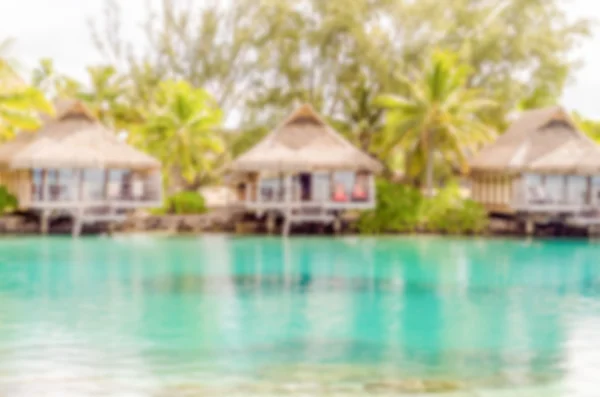 Fundo desfocado com Bungalows Overwater em Polynesi francês — Fotografia de Stock