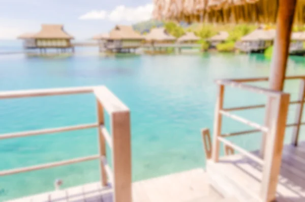 Fundo desfocado com Bungalows Overwater em Polynesi francês — Fotografia de Stock