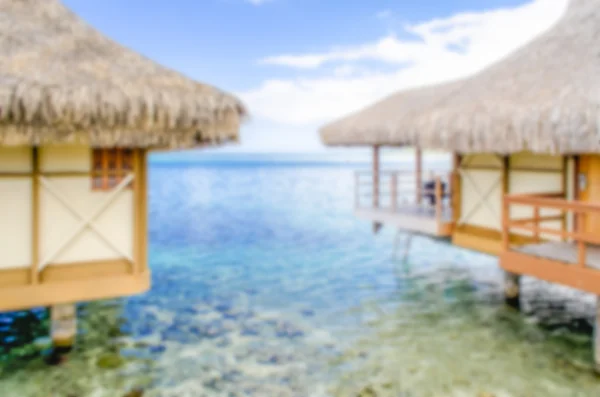 Fundo desfocado com Bungalows Overwater em Polynesi francês — Fotografia de Stock