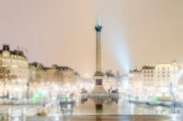Fundo desfocado de Trafalgar Square à noite, Londres — Fotografia de Stock