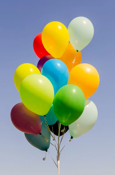Colorful bunch of helium balloons — Stock Photo, Image