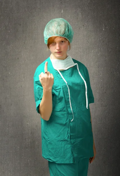 Girl showing middle finger — Stock Photo, Image