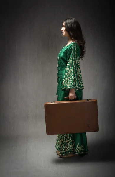 North african girl ready to travel with suitcase — Stock Photo, Image