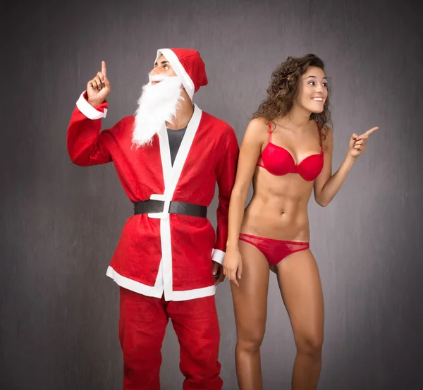 Santa Claus with woman — Stock Photo, Image