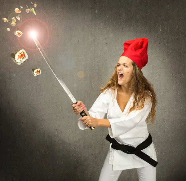 Sushi chef cutting with katana — Stock Photo, Image