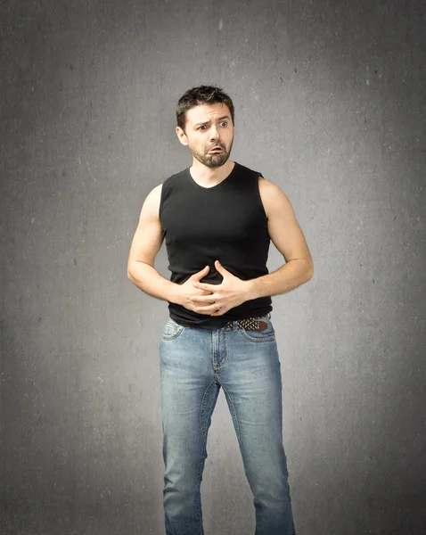 Man with terrible stomach pain — Stock Photo, Image