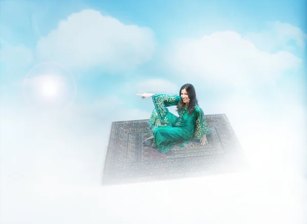 Fairy tail woman flying on the carpet — Stock Photo, Image