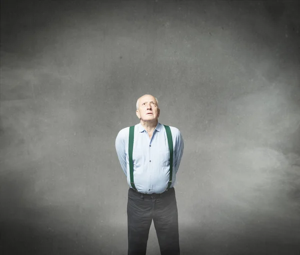 Old man emotions and expressions in gray background — Stock Photo, Image