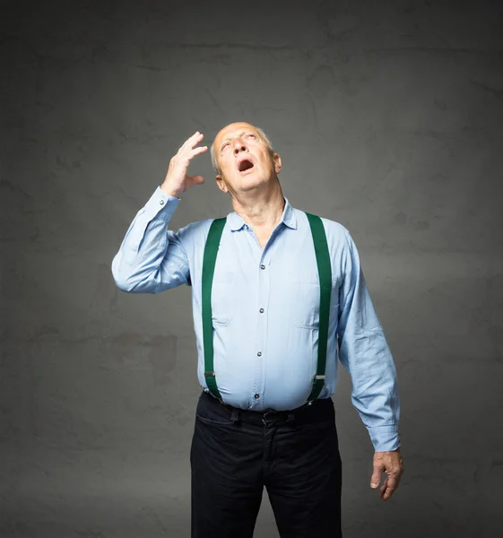 Old man emotions and expressions in gray background — Stock Photo, Image