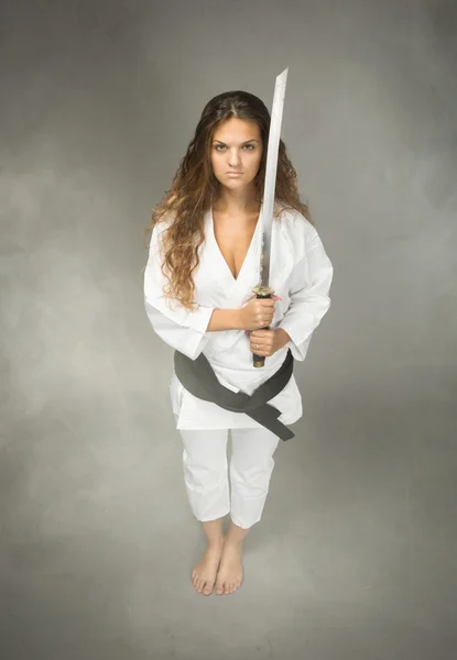 Karate performer con espada en la mano —  Fotos de Stock