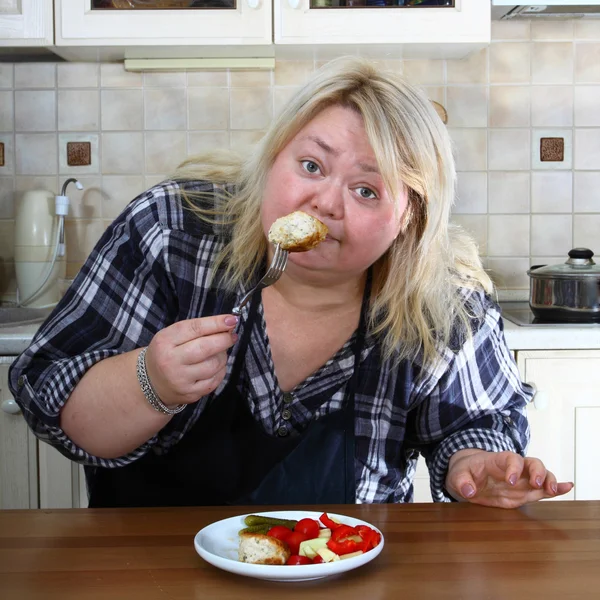 Big woman in kitchen — Stock Photo, Image