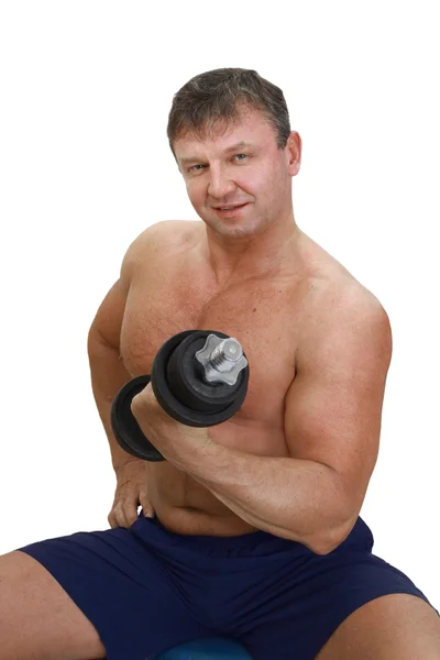 Strong man with barbell — Stock Photo, Image