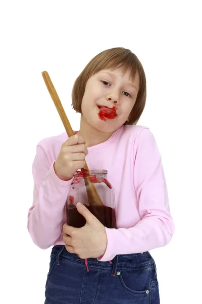 Chica con un frasco de mermelada —  Fotos de Stock