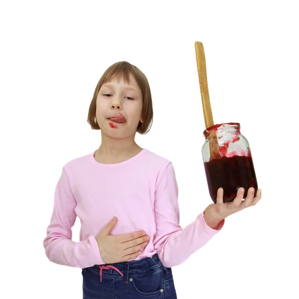 Menina com um frasco de geléia — Fotografia de Stock