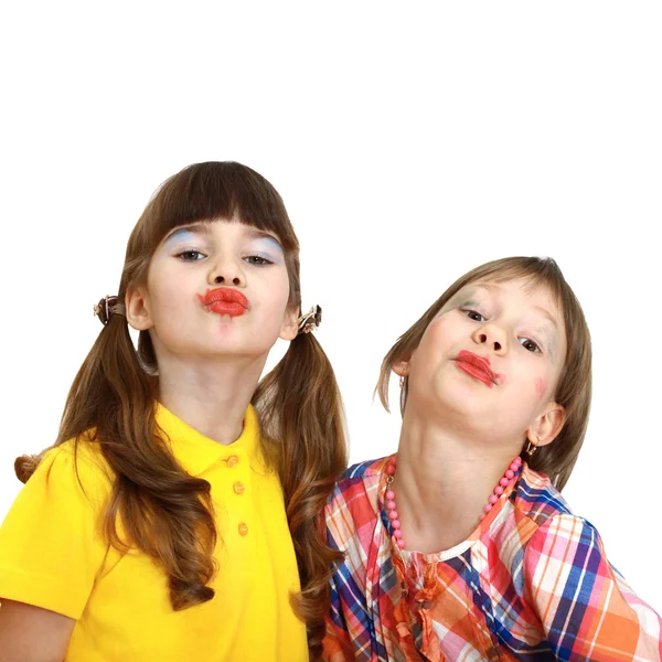 Two cute girls demonstrate painted lips — Stock Photo, Image