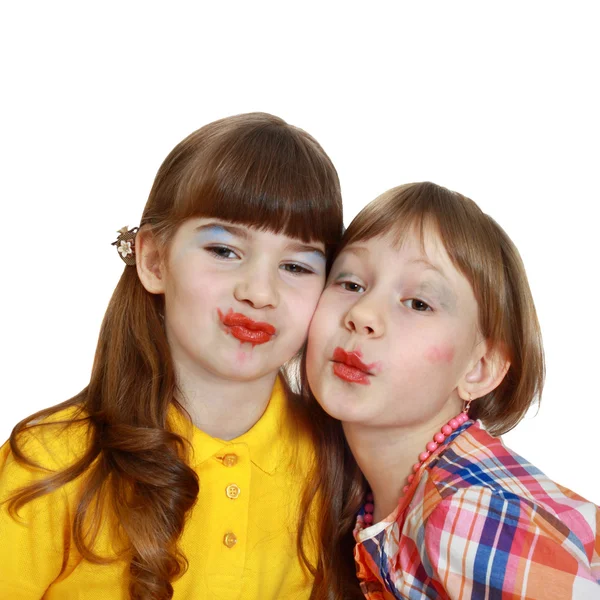 Two cute girls demonstrate painted lips — Stock Photo, Image
