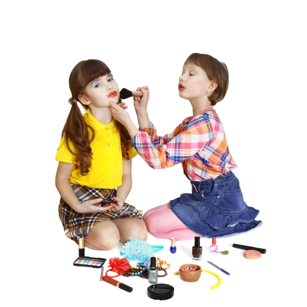 Cute girls play makeup — Stock Photo, Image