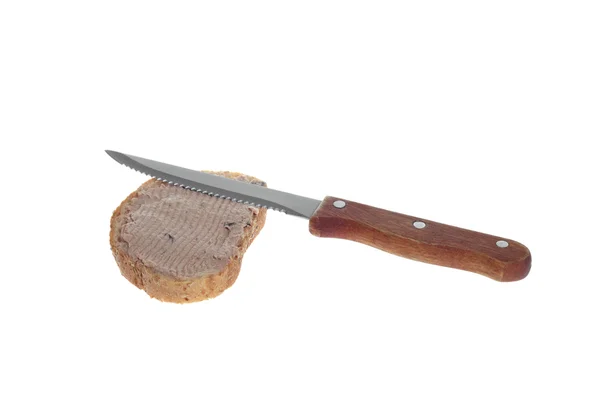 Coltello e pane spalmato con patè — Foto Stock