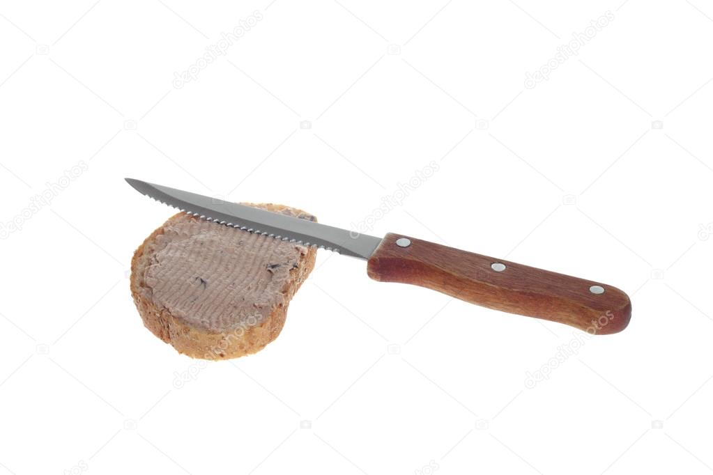 Knife and bread smeared with pate