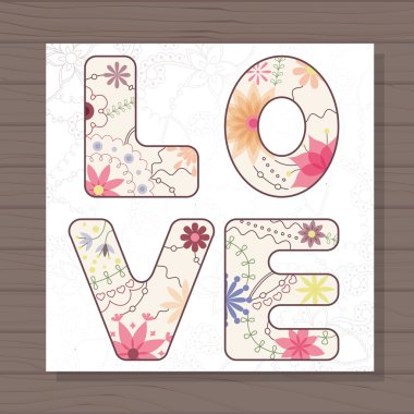 Ahşap arka plan üzerinde kart aşk