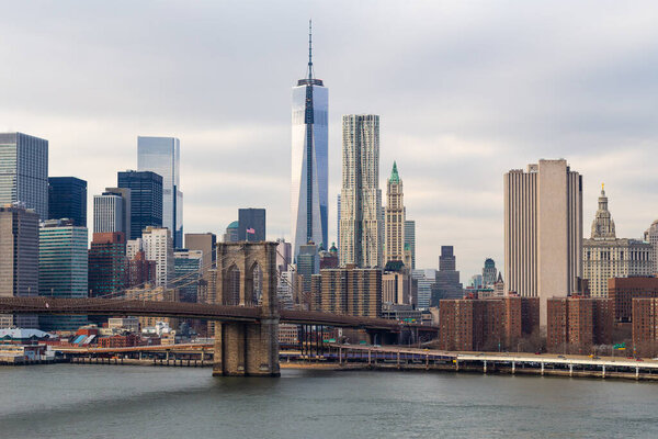 Brooklyn Bridge, Freedom Tower and Manhattan skyline, New York City.