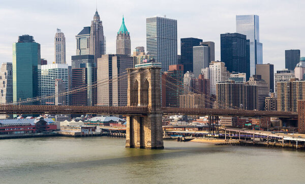 Eastern pylon of Brooklyn Bridge before Lower Manhattan, New York City