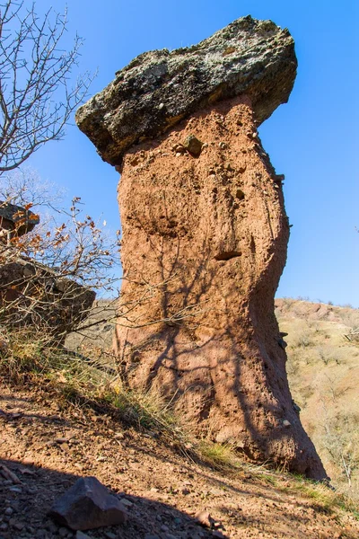 Huge rock blocks like mushroom against — Stock Photo, Image