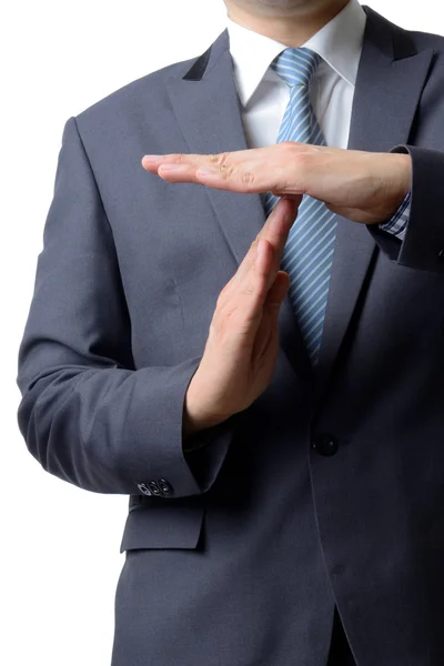 Zakenman weergegeven: time-out teken met handen tegen geïsoleerd op — Stockfoto