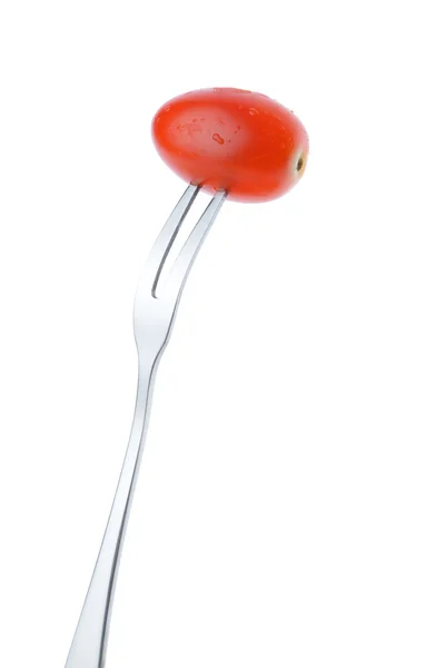 Cherry plum tomato on fork isolated on white background — Stock Photo, Image