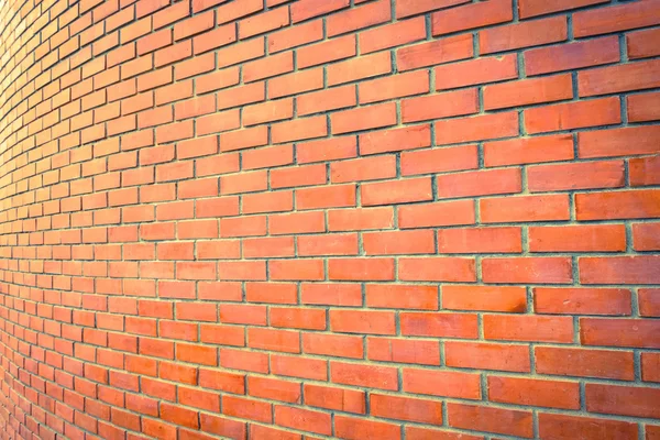 Curva pared de ladrillo marrón perspectiva de fondo — Foto de Stock