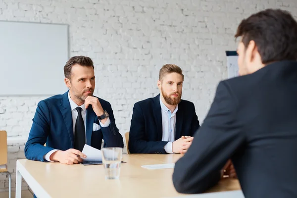 Men recruit candidate in  their office — Stock Photo, Image