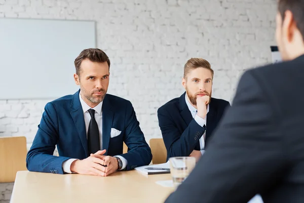 Businessmen discussing during meeting — Stock Photo, Image