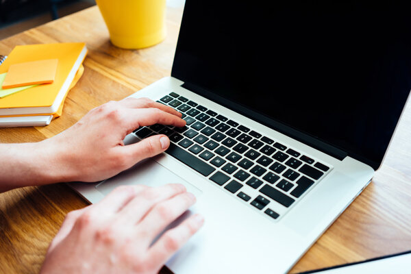 man using laptop 