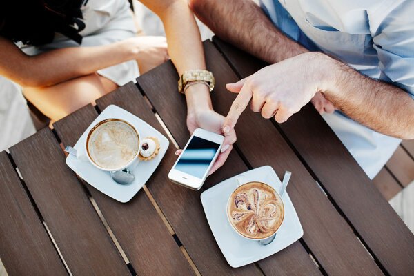 Female hand holding a smartphone