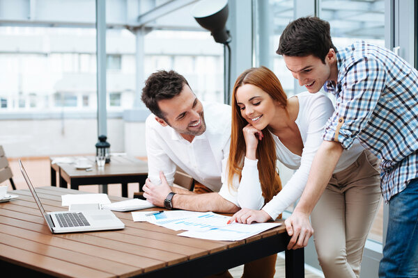 Business people discuss financial data