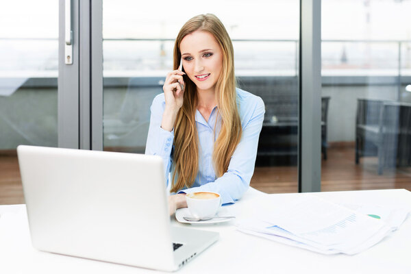 Businesswoman talking on mobile phone