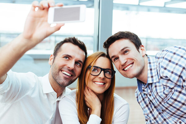 Three students taking a selfie