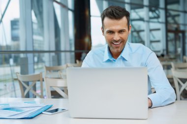 Handsome confident businessman