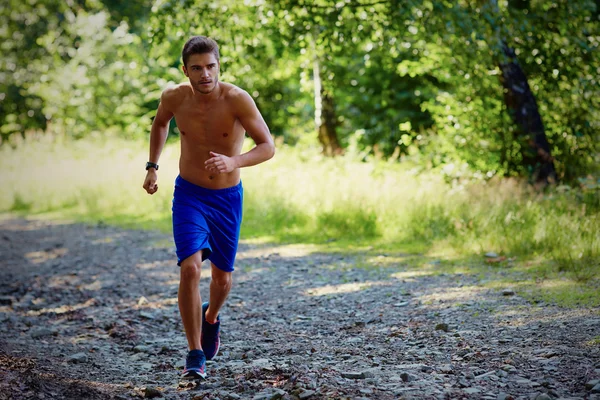 Hombre entrenamiento prueba corriendo — Foto de Stock