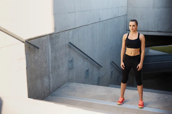 Focused female runner — Stock Photo, Image