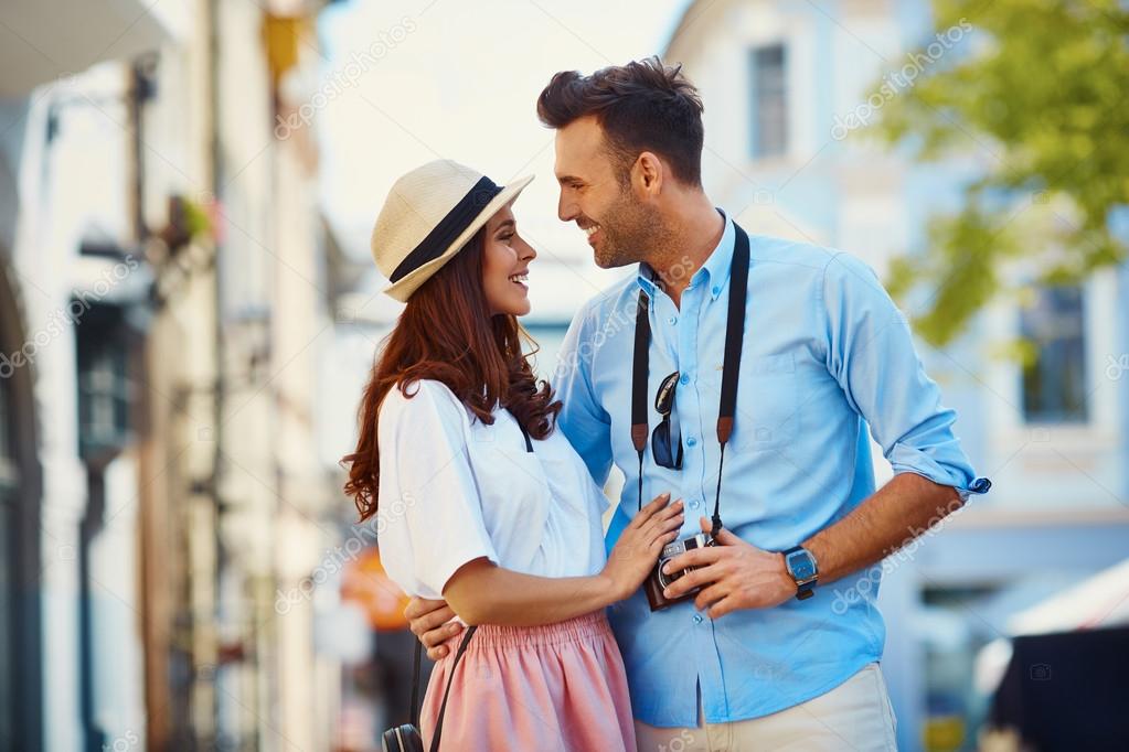 Happy couple of tourists