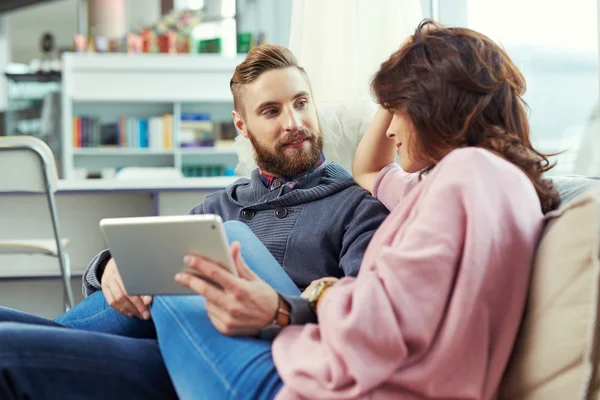 Couple spending time at library — Stock Photo, Image